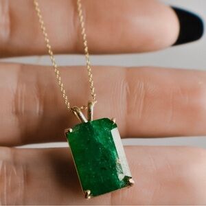 Emerald cut elegant necklace, raw emerald set in 14 k gold. New